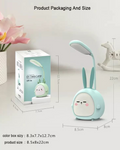 rabbit-shaped night lights on a wooden surface
