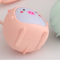 Pink cartoon-style container with a face on a light background