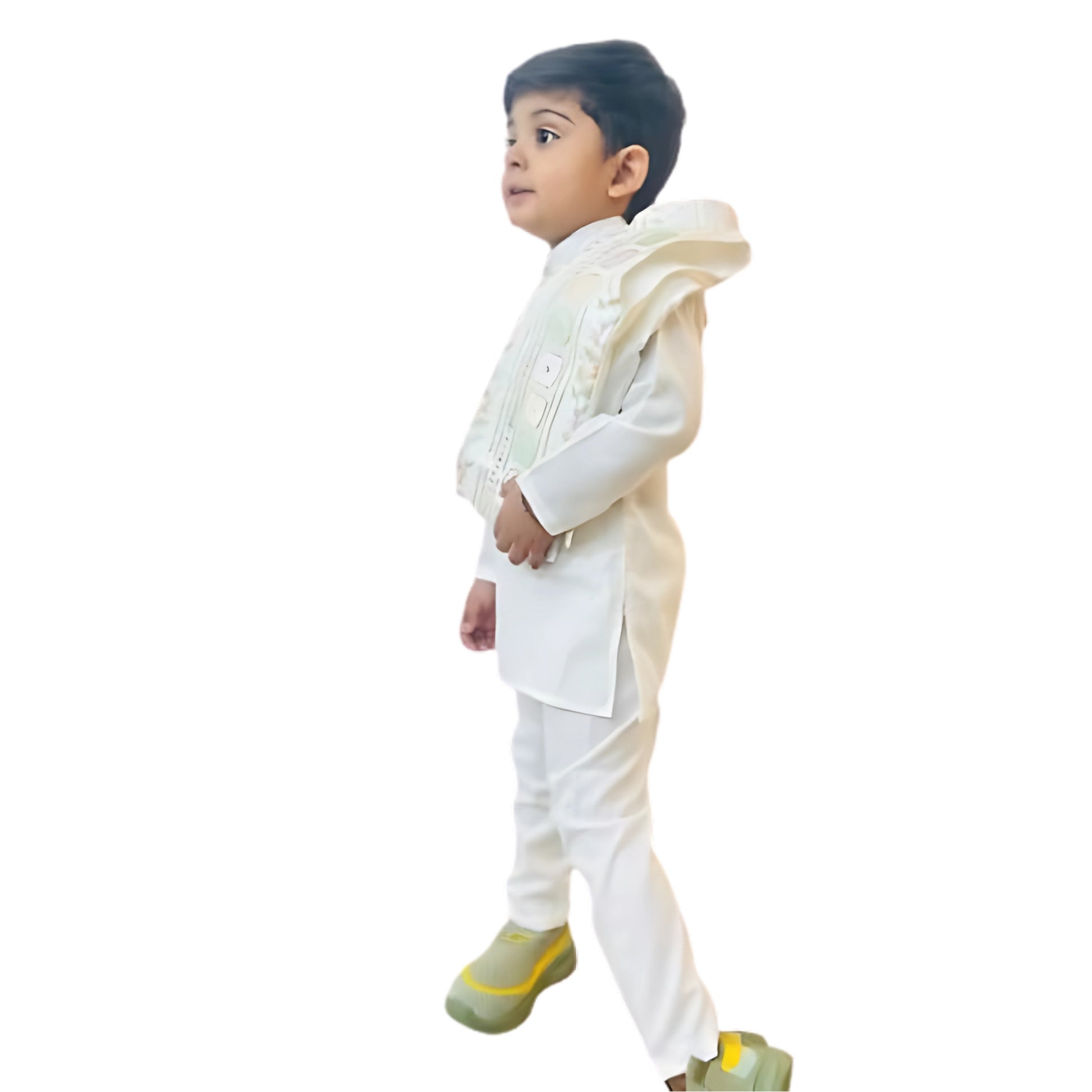 Child wearing a traditional outfit with a white kurta and cream vest on a white background