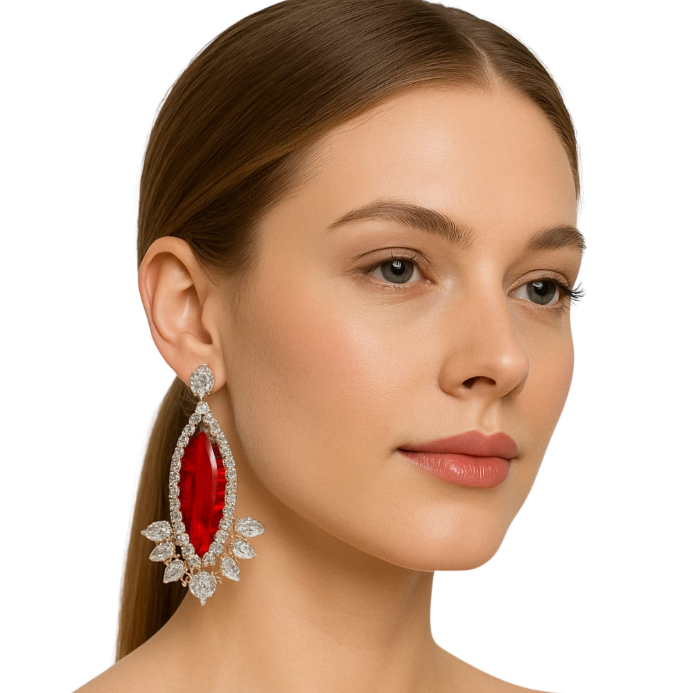 Woman wearing a red gemstone earring with a white background