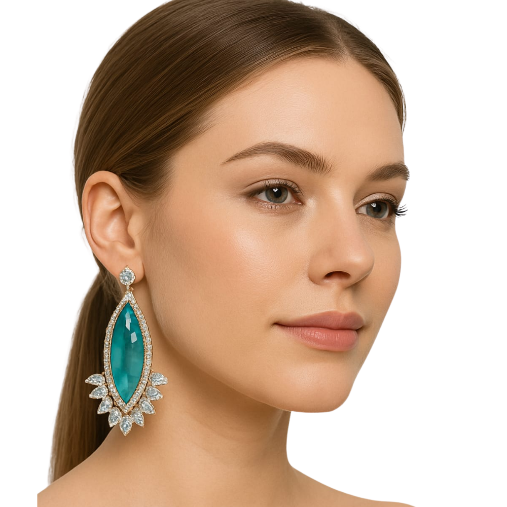 Close-up of a woman wearing a turquoise earring with a white background