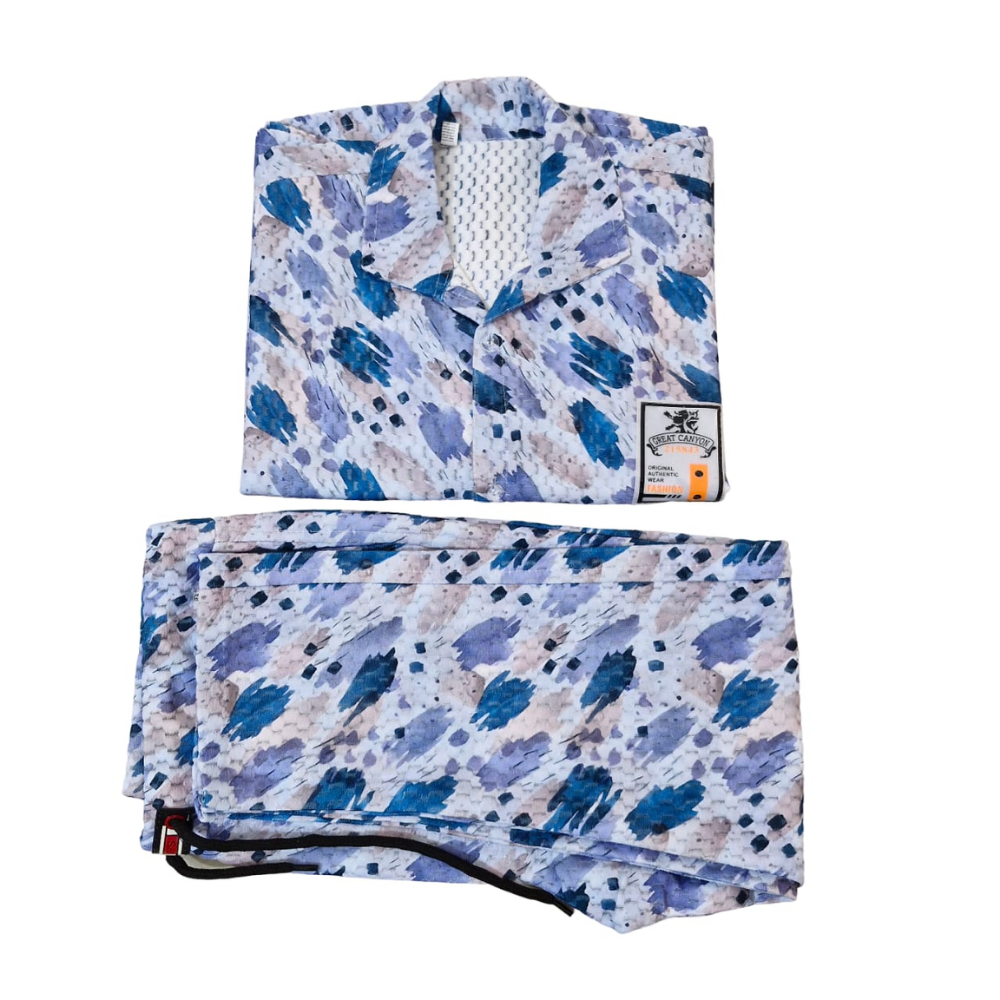 Folded fabric with blue and purple abstract pattern on a white background