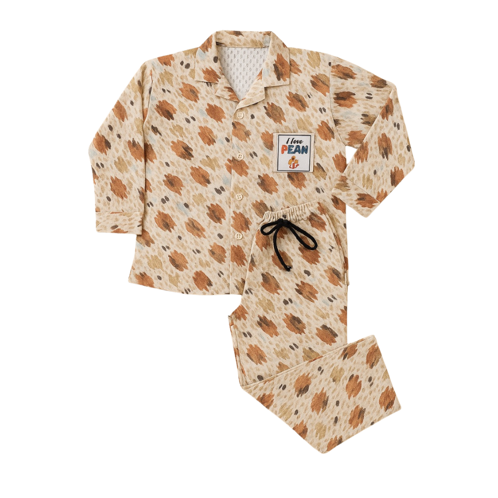 Children's pajama set with leaf pattern on a white background