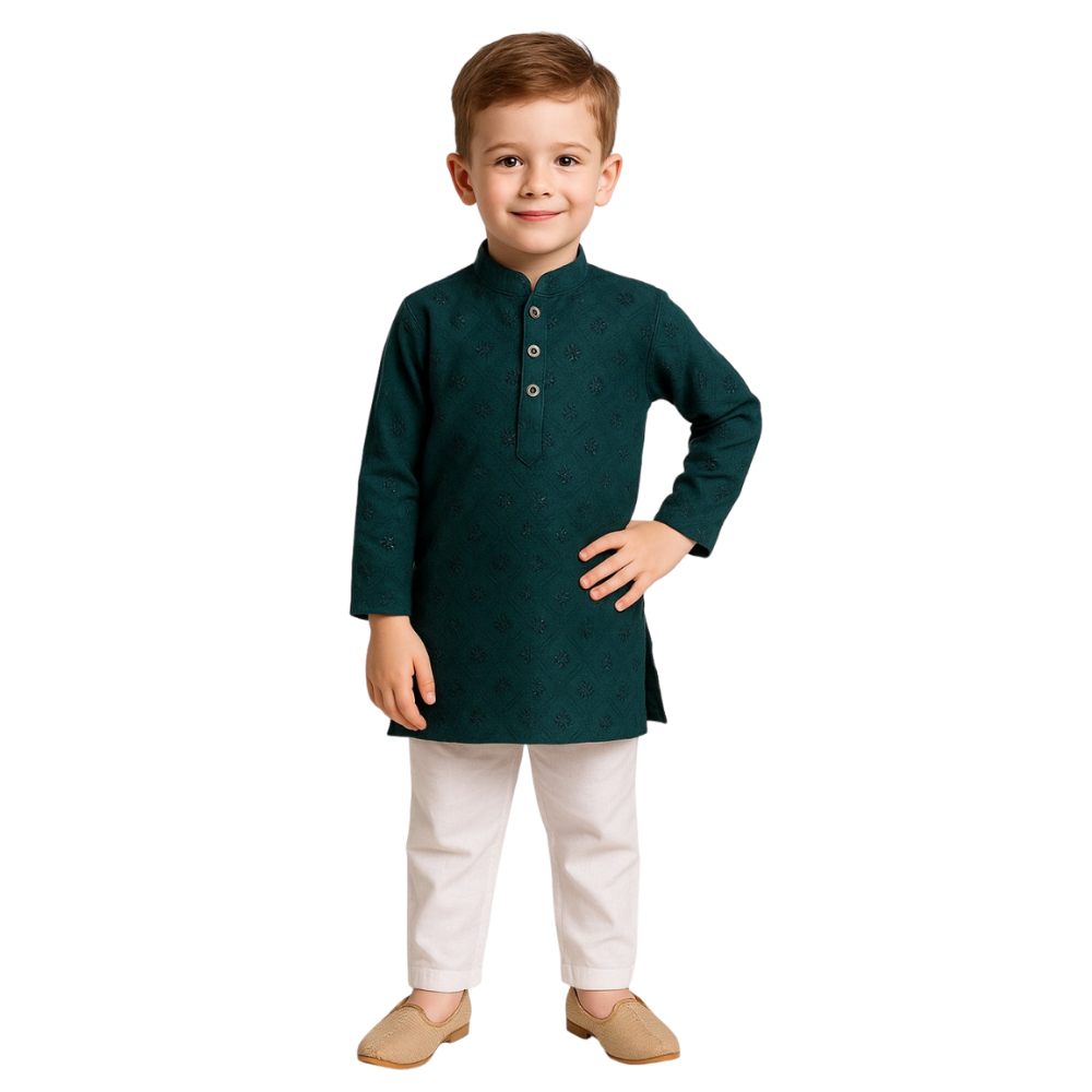 Child wearing a green kurta with white pants on a white background