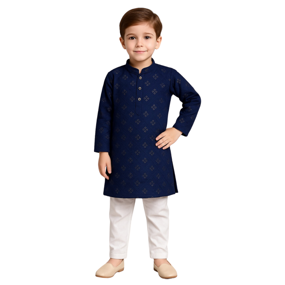 Child wearing a navy blue kurta with white pants on a white background