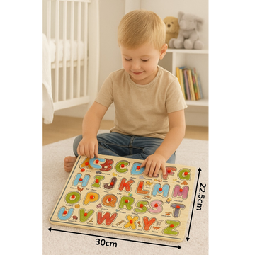 Child playing with a wooden alphabet puzzle in a nursery setting