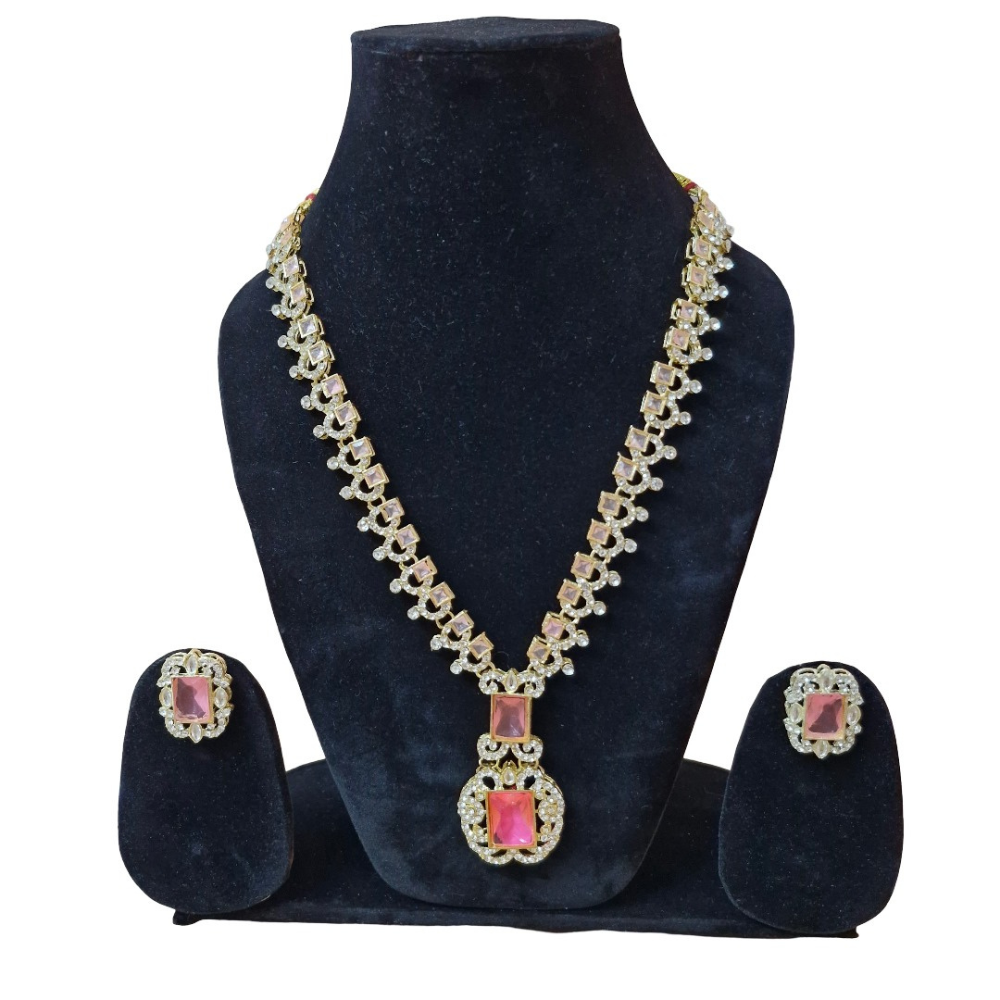 Jewelry set with necklace and earrings on a black stand