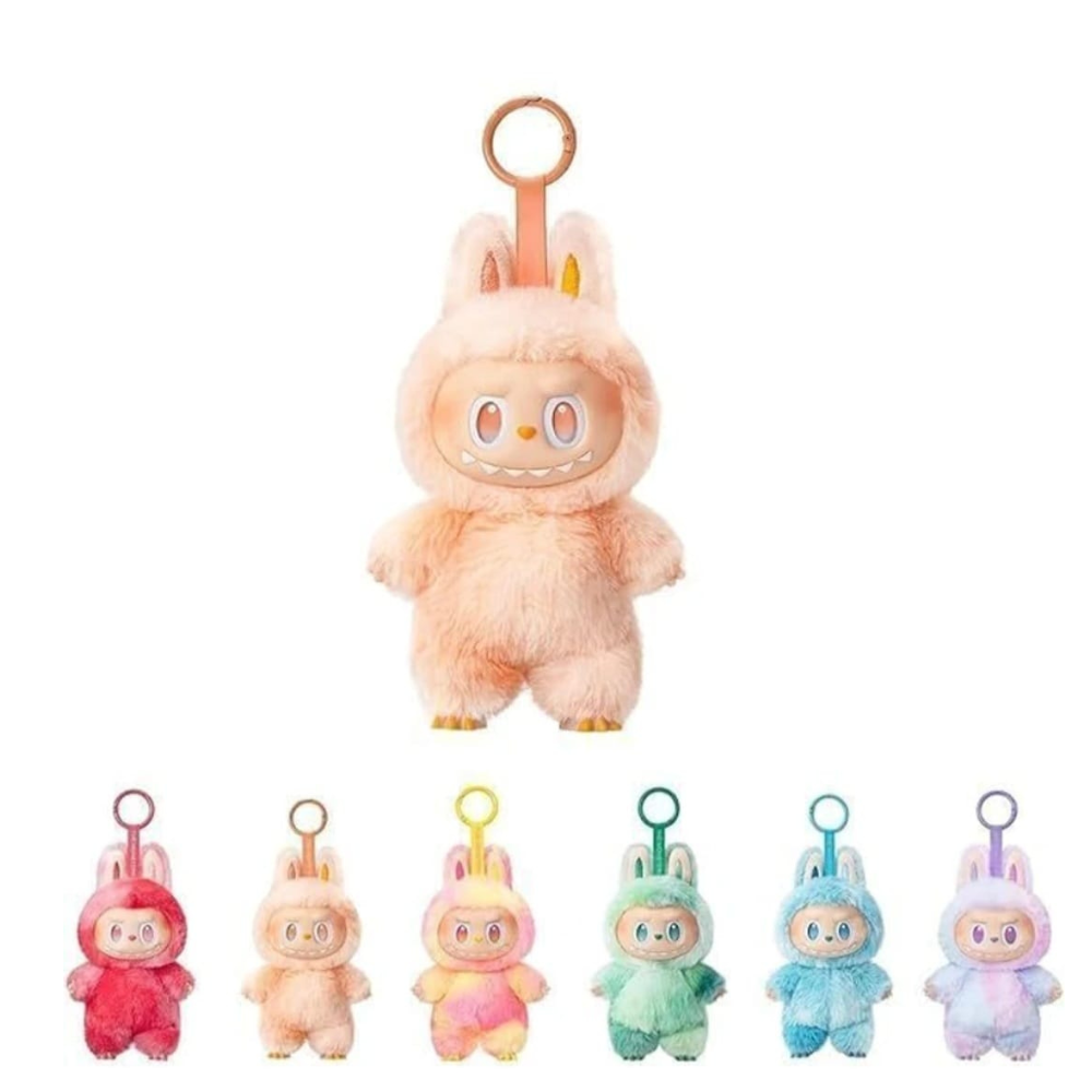 Set of colorful plush keychains with different animal designs on a white background