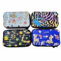 Four colorful cases with floral, zebra, and deer patterns on a white background