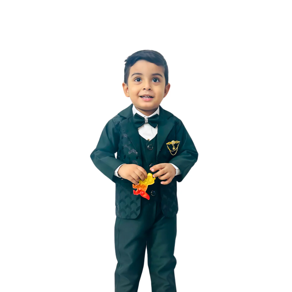 Child wearing a green suit with a bow tie on a white background