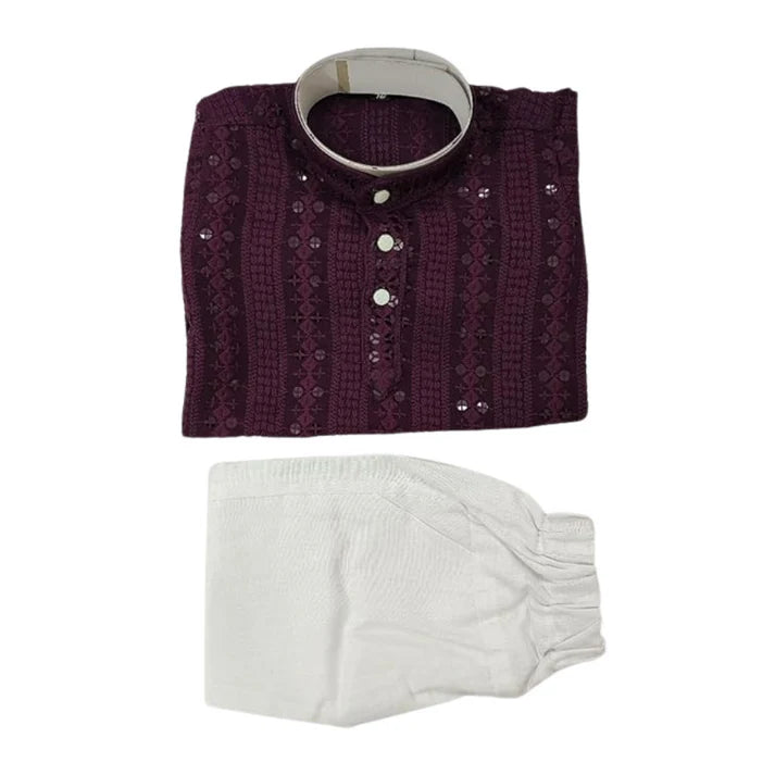 Folded dark purple embroidered shirt with white pants on a white background