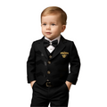 Young boy wearing a formal black suit with a bow tie on a white background
